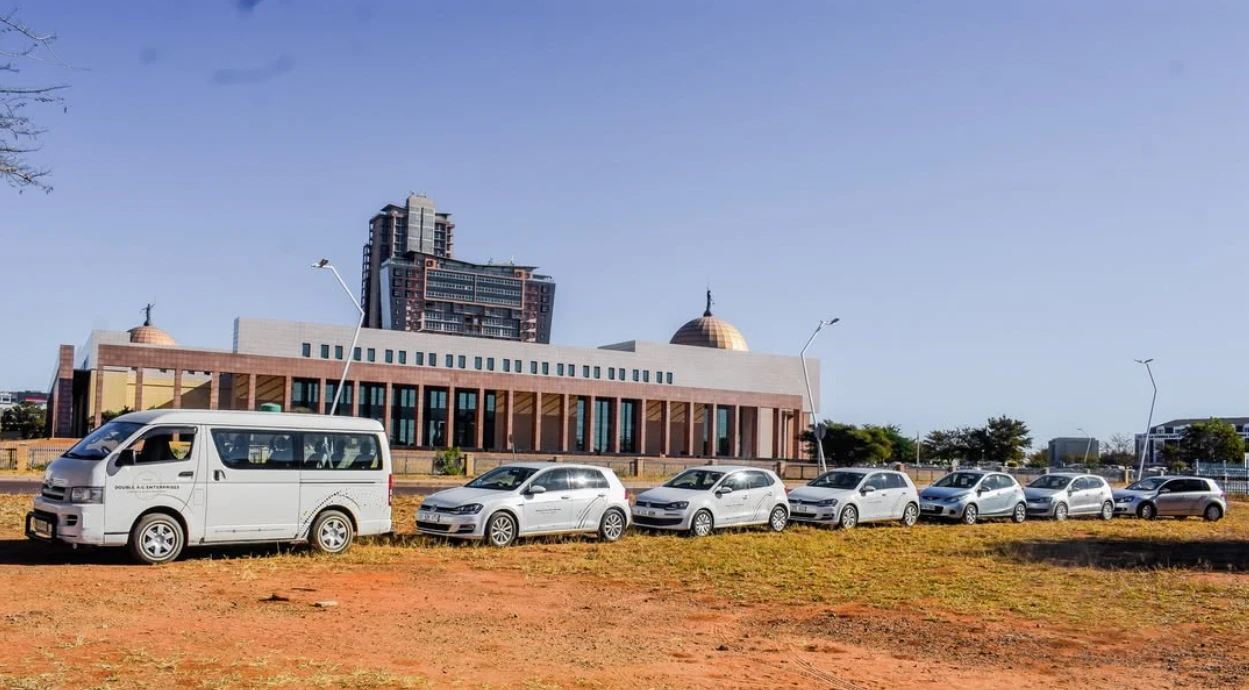 Double A. G fleet of van and hatchbacks lined up in Gaborone
